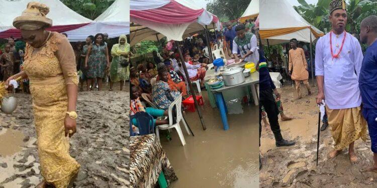 nigerian-couple-accept-unexpected-heavy-rain-for-wedding-reception